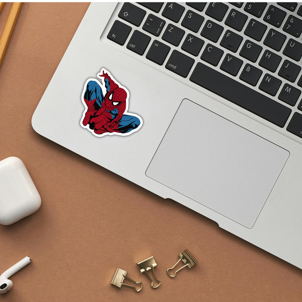 Classic Spider-Man crouching sticker on laptop