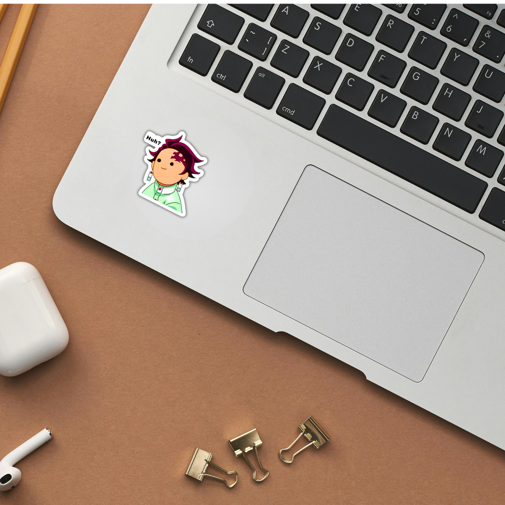 Huh Tanjiro Demon Slayer sticker applied to a laptop