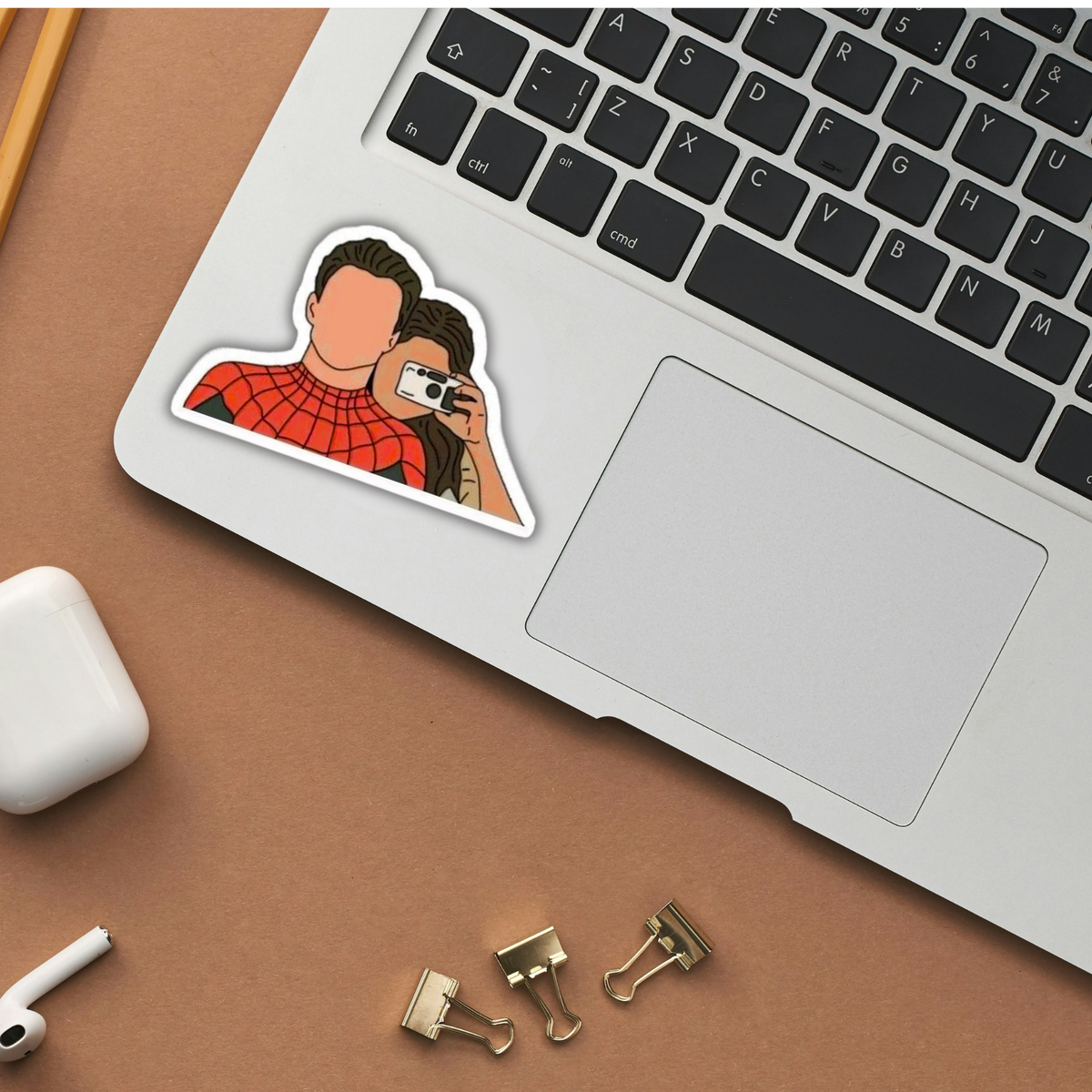 Spider-Man and MJ selfie sticker on laptop