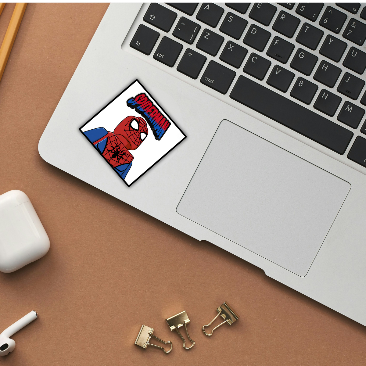 Spider-Man LEGO minifigure sticker on laptop