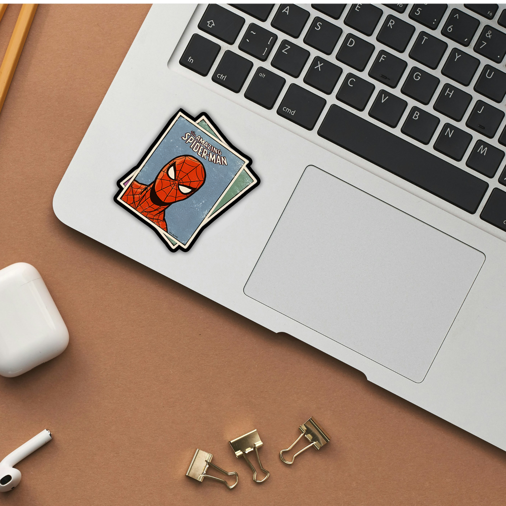 The Amazing Spider-Man comic card sticker on laptop