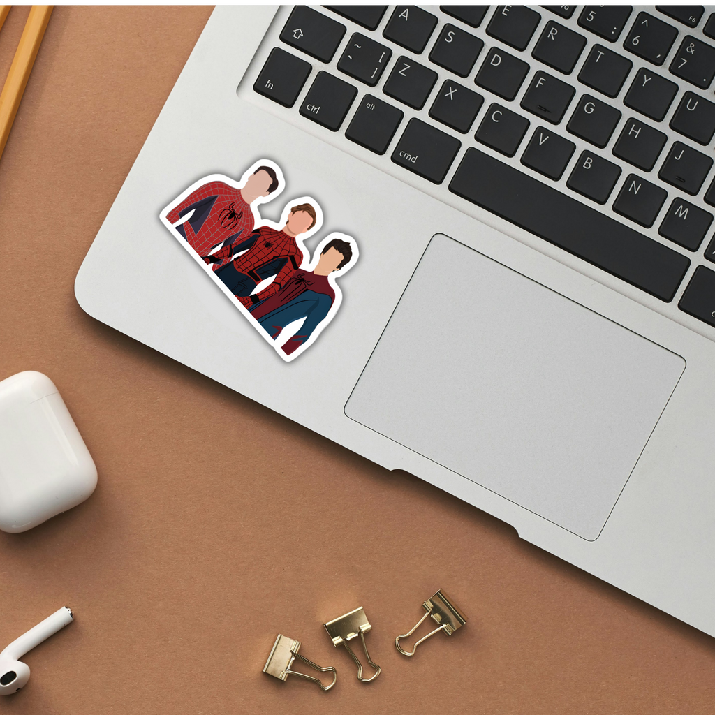 Three Spider-Men sticker on laptop