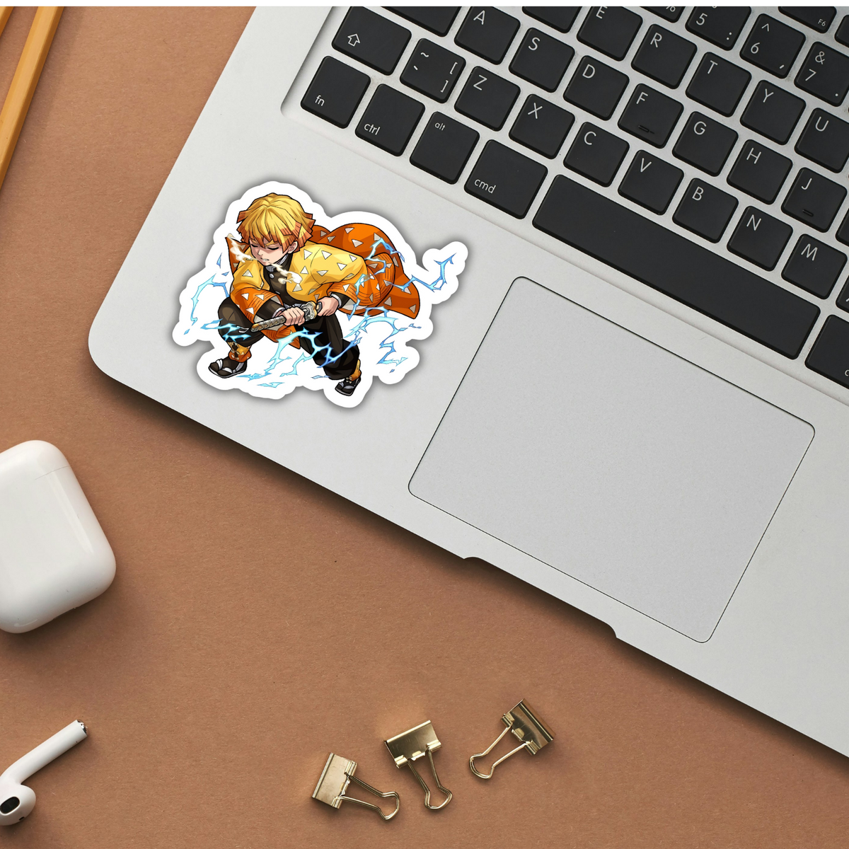 Zenitsu Thunder Breathing Demon Slayer sticker applied to a laptop