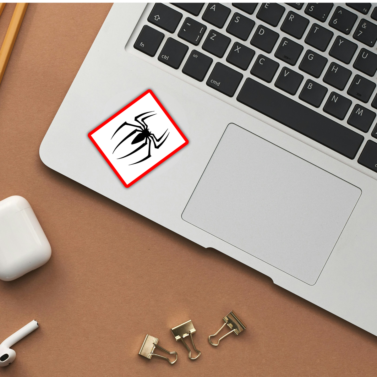 Spider-Man logo red border sticker on laptop