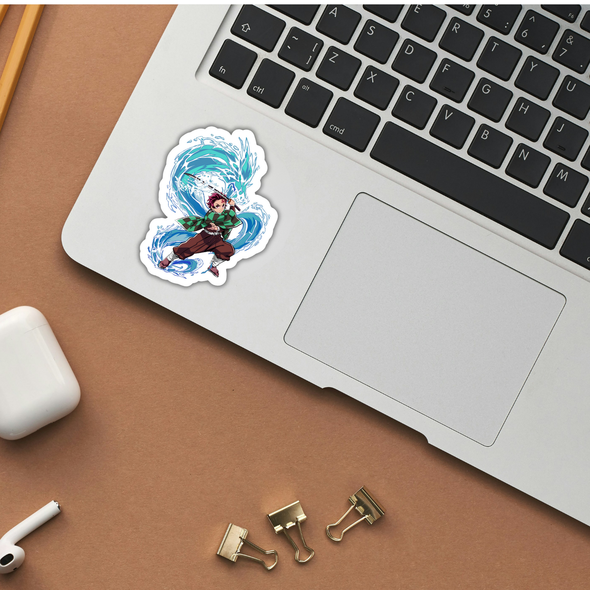 Tanjiro Water Breathing Demon Slayer sticker applied to a laptop