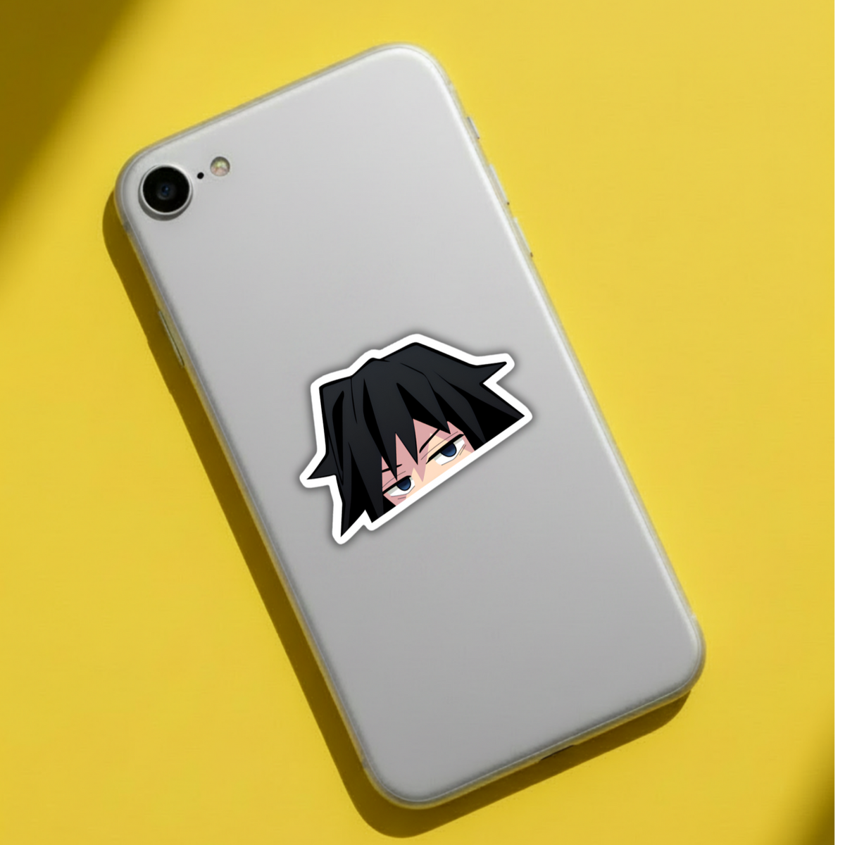 Giyu Tomioka Demon Slayer sticker applied to a laptop