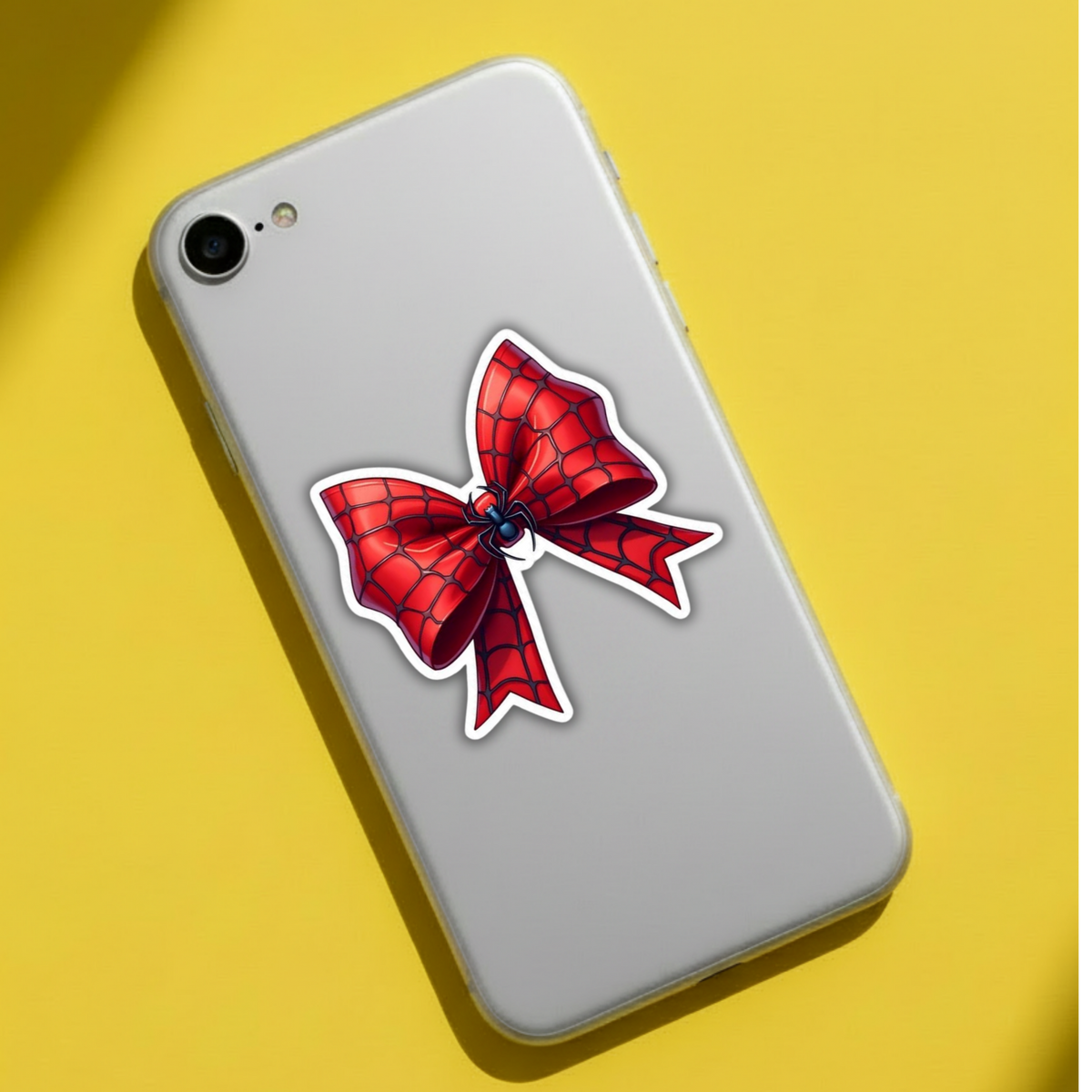 Spider-Man web bow sticker on phone