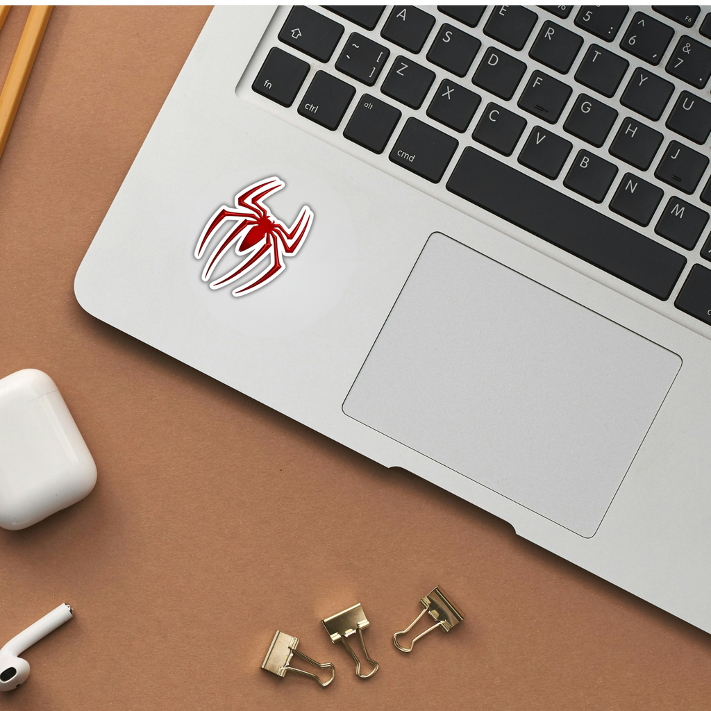 Spider-Man logo sticker on laptop